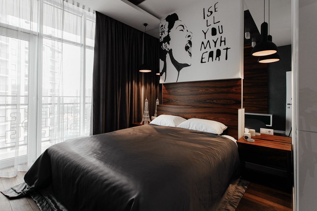 Couleur noire dans la conception de la chambre pour un homme
