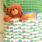 Taie d'oreiller pour enfants avec une poche pour les petites choses