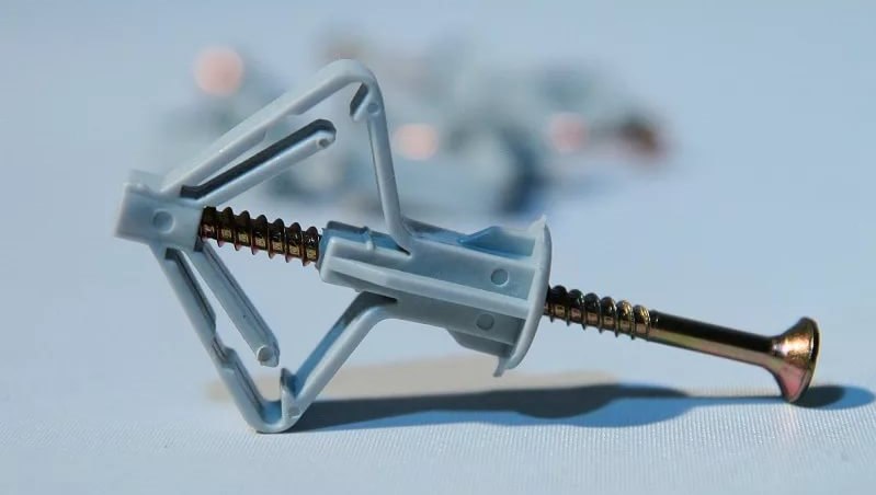 Photo of a plastic dowel butterfly for drywall