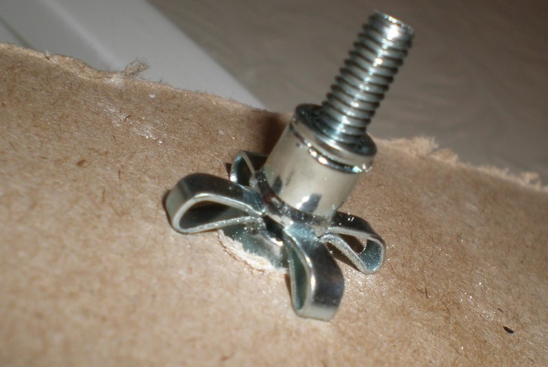 Fastening in drywall metal dowel butterfly