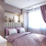 Lámpara colgante sobre la cama en el dormitorio.