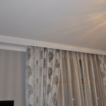 Polyurethane baguette on the ceiling cornice