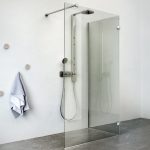Shower without a tray with a glass partition