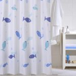 Fish on the fabric curtain in the bathroom