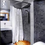 Wooden grill on the floor in the shower