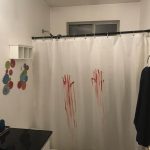 White curtain on a black cornice