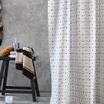 Striped towel on a wooden stool