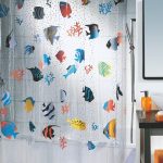 Colored fish on a polyester curtain