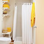 Yellow towels on the open shelves