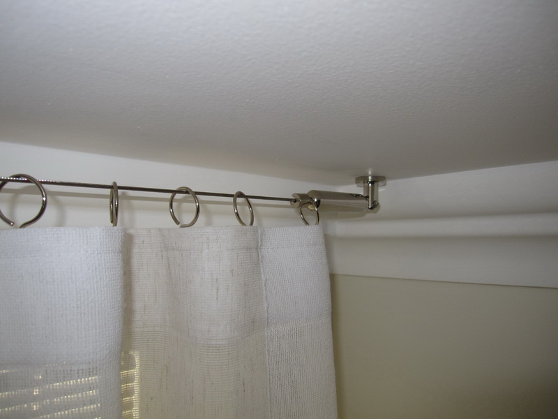 White curtain on the string of the ceiling eaves