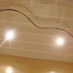 Eaves irregular shape on the ceiling in the shower