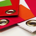 Cartelle di carta con occhielli di metallo