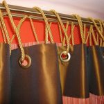 Tenda con fissaggio su occhielli in ottone