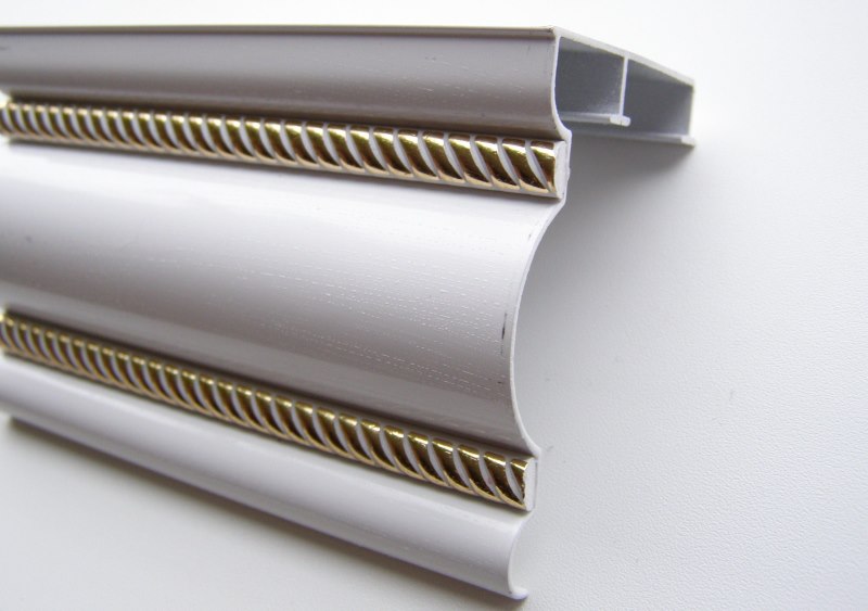 Aluminum rail molding with decorative gilding