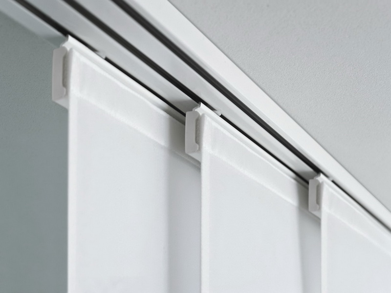 White linen Japanese curtains on the ceiling cornice
