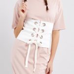 Girl with a belt grommet