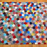 Chic couverture laborieuse d'hexagones