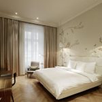 Interior bedroom with curtains to the ceiling