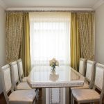 Dining table with glossy table top