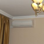Satin curtain on the ceiling of the living room