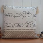 Housse de coussin confortable dans des tons doux avec fermeture à glissière