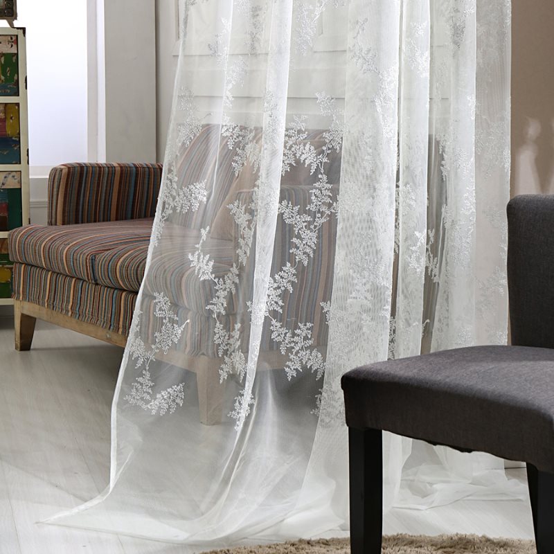 tulle สีขาวลายดอกไม้