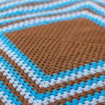 Plaid tricolore pour enfants sous la forme d'un grand carré