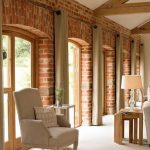 Loft-style living room with eyelet curtains