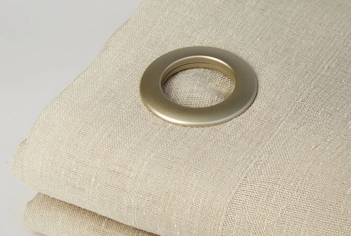 Plastic grommet on a light curtain