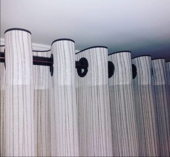 Eyelets on the curtains in contrasting colors