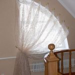 Semi-arched window with an unusual mount curtains