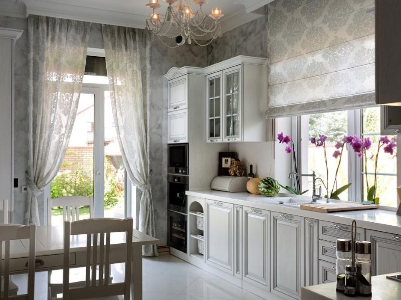 Different curtains in the interior of a cozy kitchen