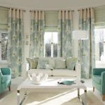 Eyelet Curtains with Beautiful Flowers in the Living Room