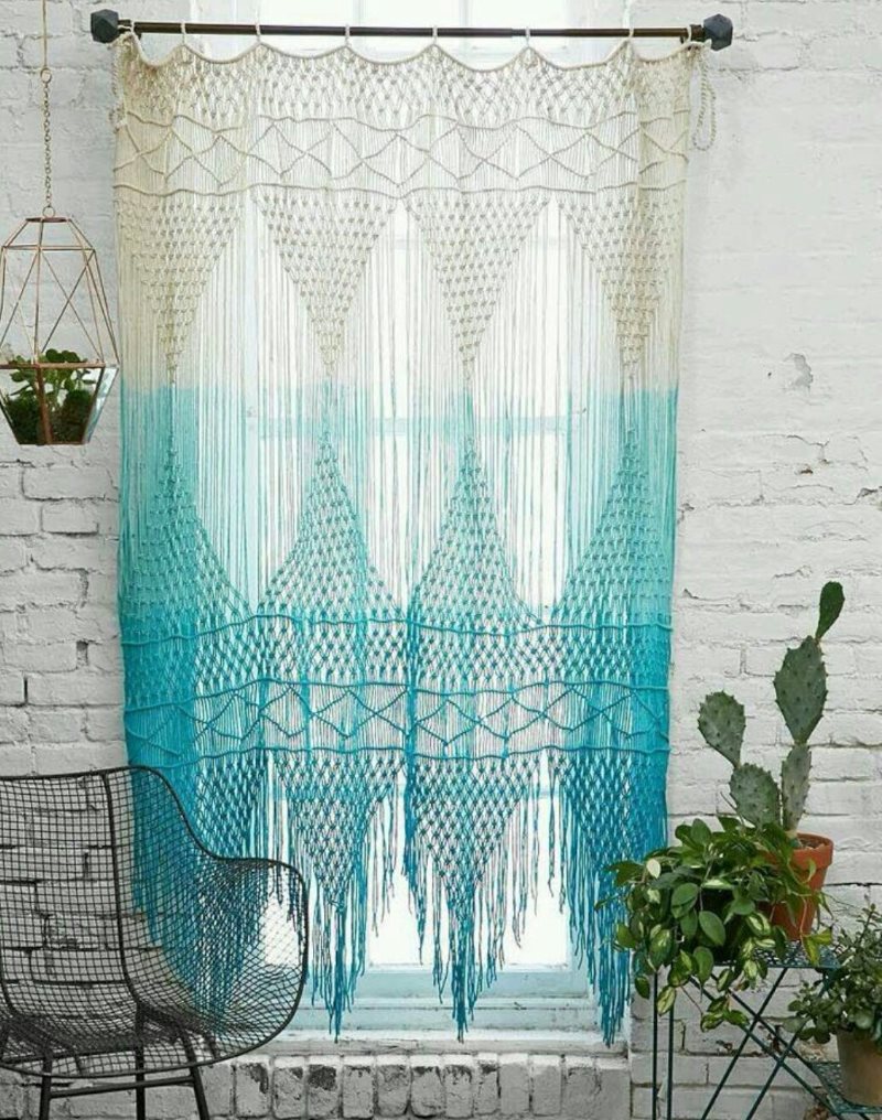 Rope curtain with color transition on a black cornice