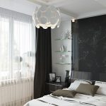 Combinaison de tulle blanc et de rideaux noirs dans la chambre
