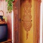 Composition in the style of macrame on the door in a private house