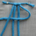 Formation of the first knot when weaving Macrame curtains