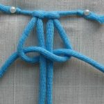 Tying extreme rope knot macrame flat knot