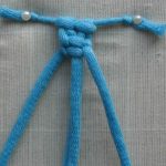 The beginning of weaving a twisted chain of thin ropes