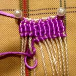 Safety pins fastening wicker curtain blanks