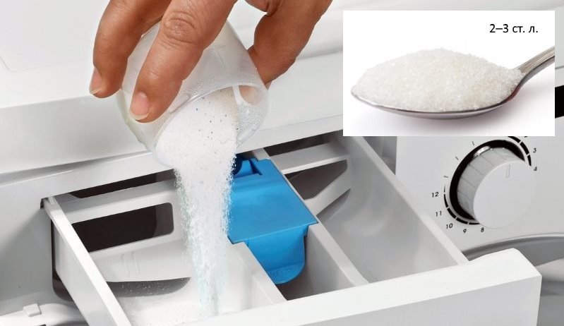 Pouring the whitening powder into the washing machine compartment
