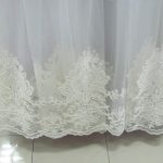 tulle dengan hiasan gambar sulaman