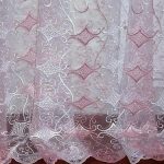 tulle dengan hiasan sulaman