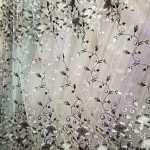 tulle dengan gambar rekaan sulaman