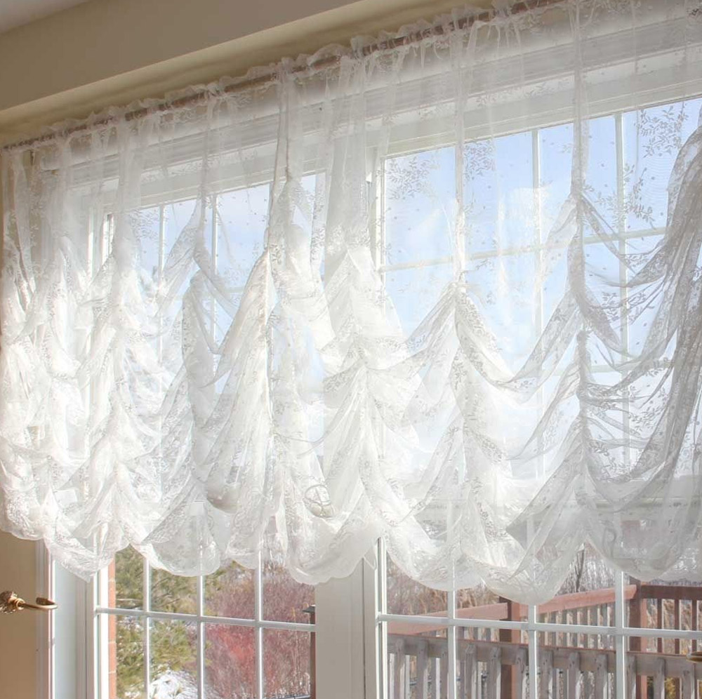 cortinas francesas en el balcón