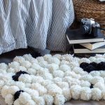 tapis fait de pompons faites le vous même