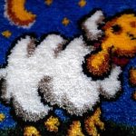 tapis d'agneau brodé