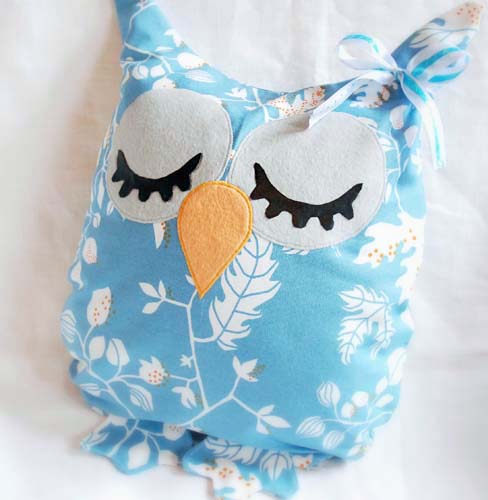 hibou d'oreiller longeant