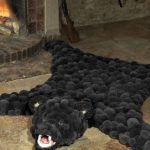 tapis de peau de pompons